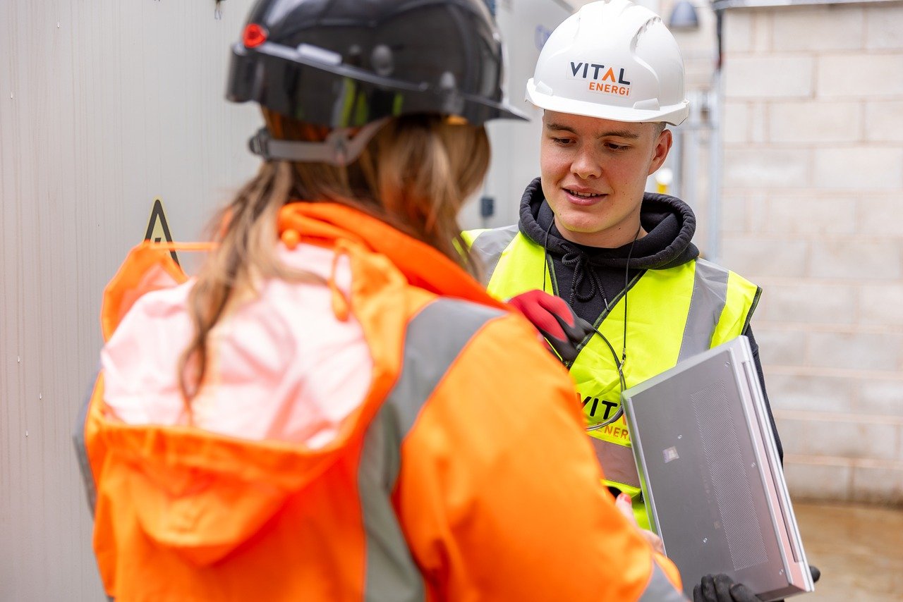 Decorative: young engineer in high-viz and hard hat