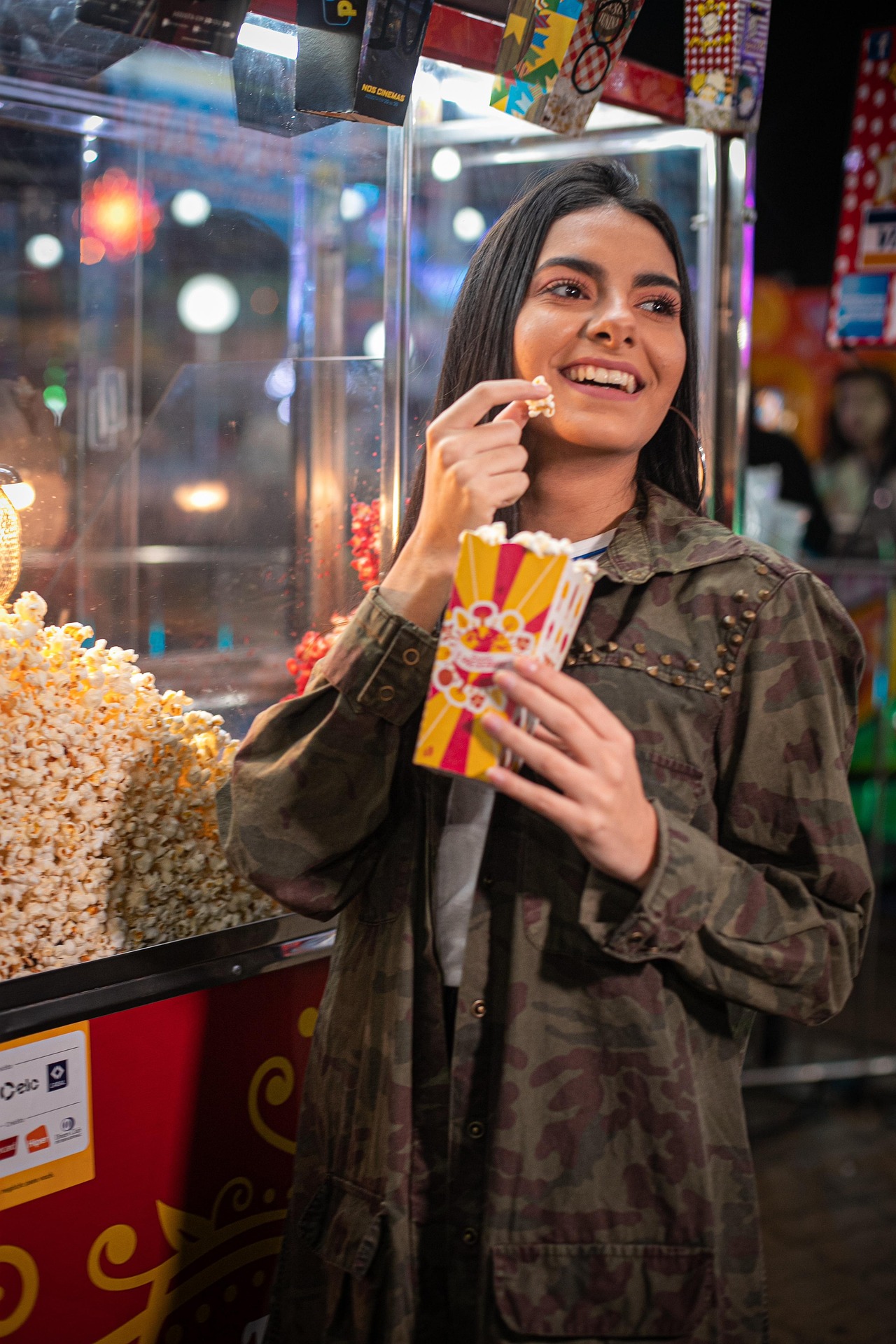 Decorative: woman smiling eating pop corn